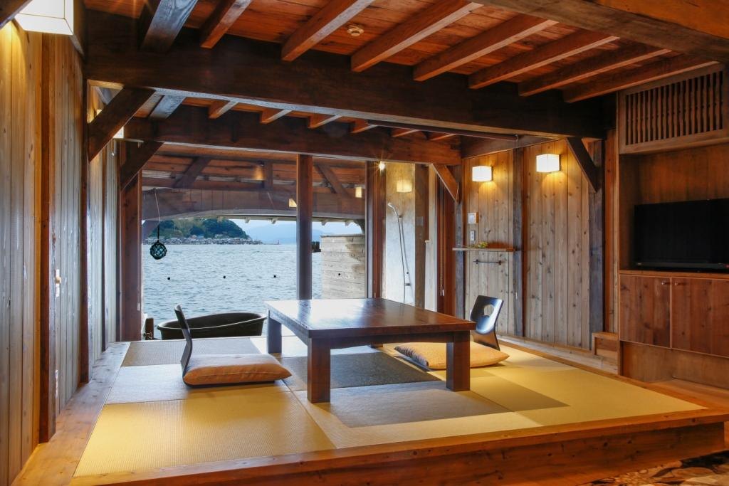 伊根の舟屋 雅 — 与謝郡伊根町平田・舟屋2階の客室から伊根湾と対岸を望む